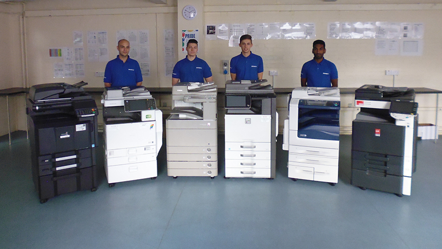 Tecserv team with photocopiers